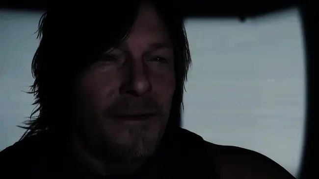 Woodkid与小岛秀夫在录音室讨论配乐细节,背景为《死亡搁浅2》的游戏画面