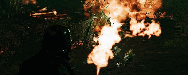 《绝地潜兵2》游戏中火焰喷射器正在焚烧敌人，场景充满炽热火焰特效