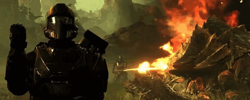 绝地潜兵2中毒伤与燃烧效果对比示意图,画面展示角色被绿色毒雾包围与红色火焰灼烧的不同状态