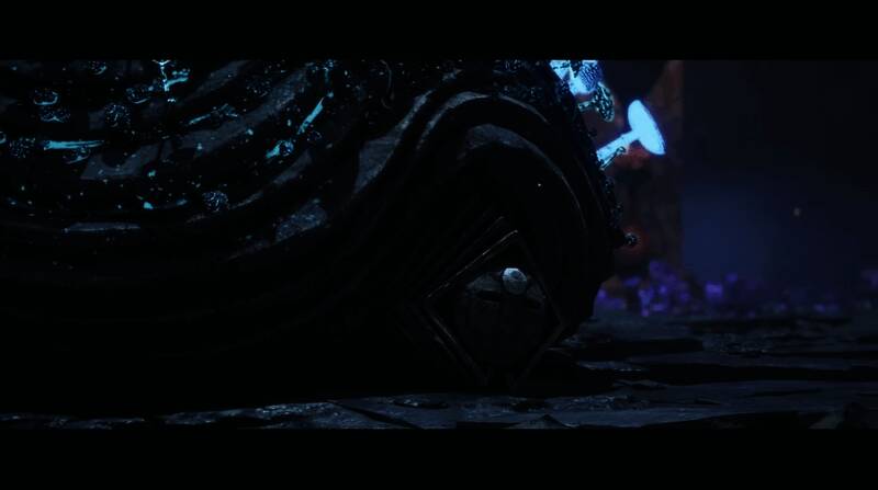 马克森斯·卡佐拉正在进行动作捕捉工作的现场照片,身旁摆放着矿泉水