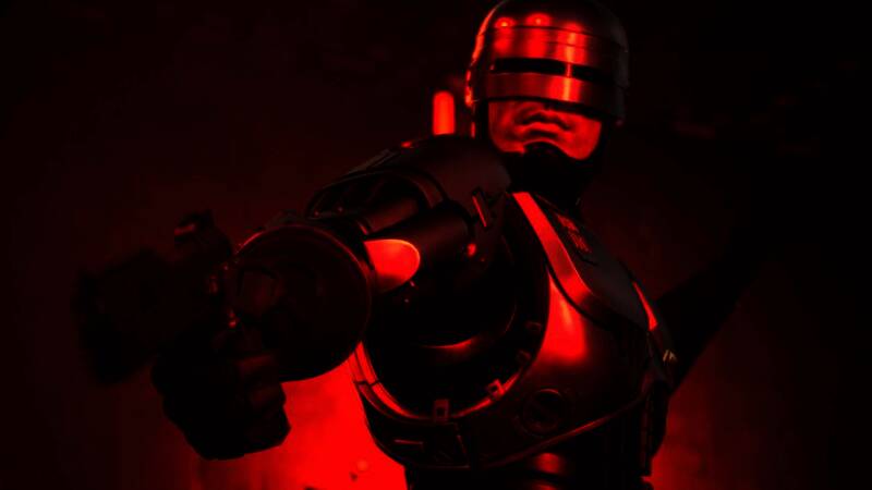 《机械战警:暴戾都市 - 未竟之事》游戏画面,展现未来都市与机械战警的英姿