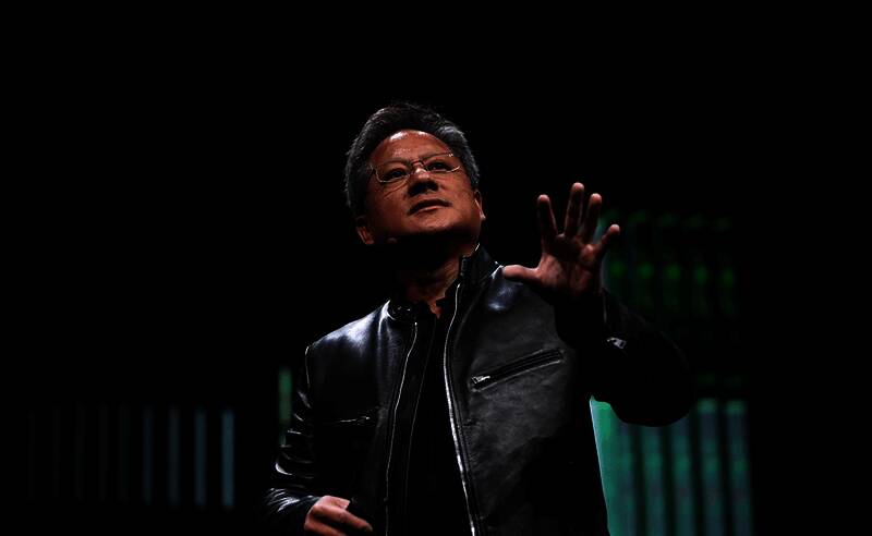 黄仁勋与小米创始人雷军合影,背景为英伟达与小米合作项目展示