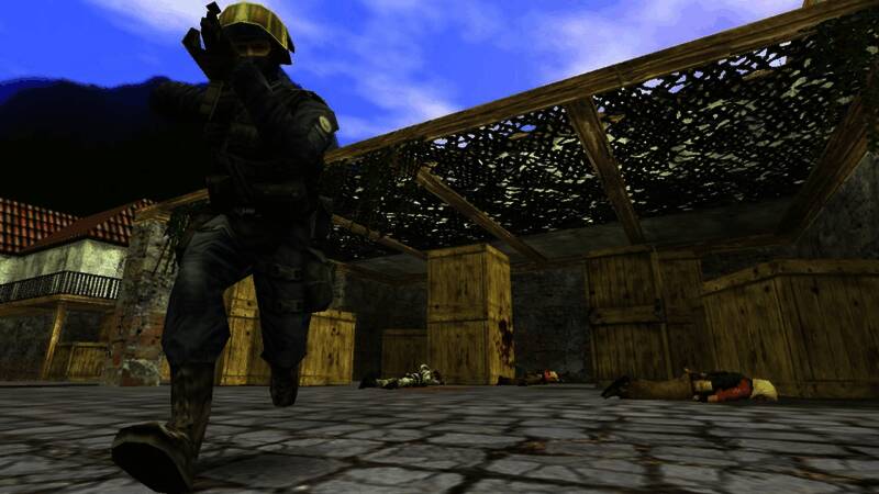 《反恐精英1.0》早期游戏画面,显示两名玩家在废弃工厂中对战